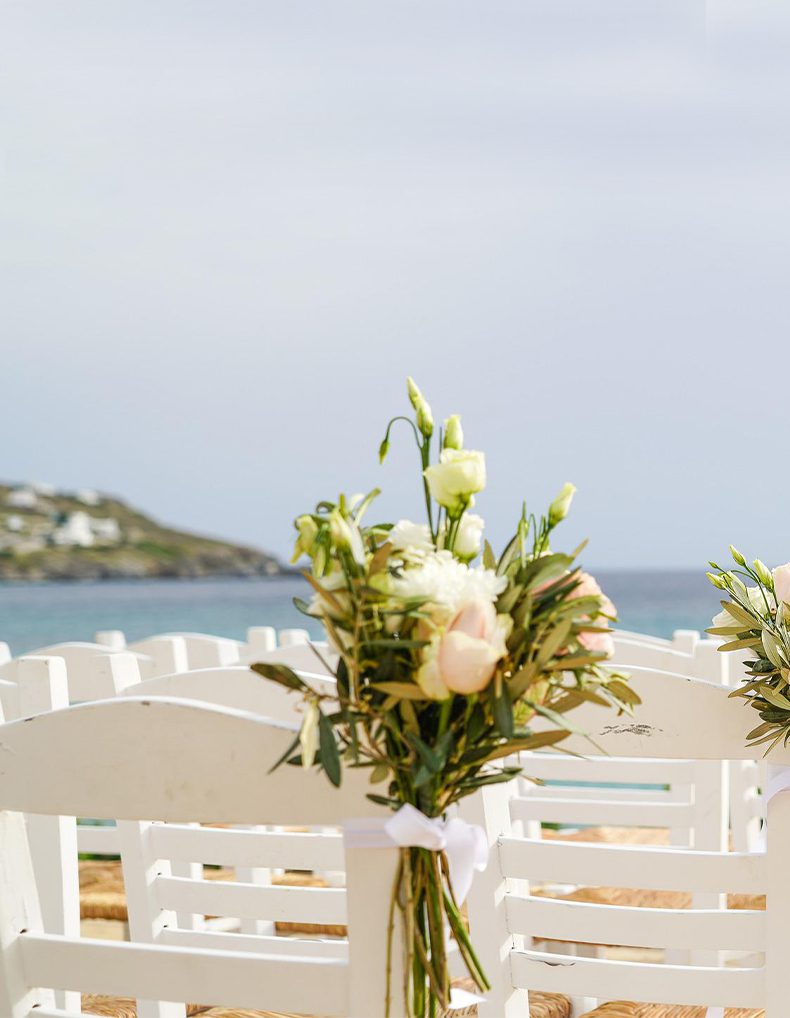 flowers on chair at the beach